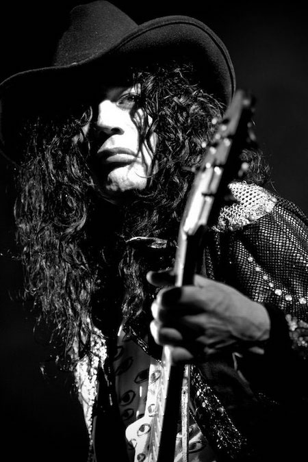 Curly rocker hair extensions.